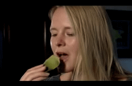 person eating an artichoke