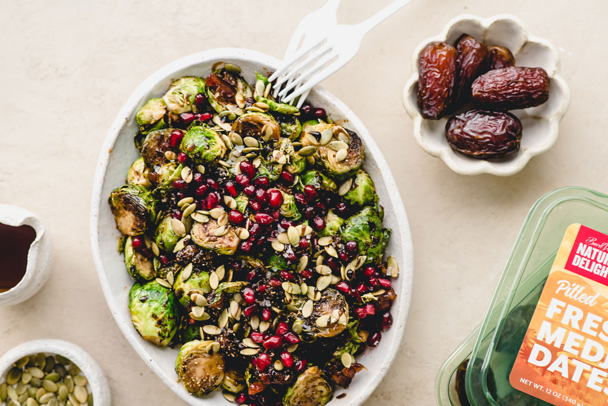 Maple and Date Balsamic Brussels with Pomegranate Seeds