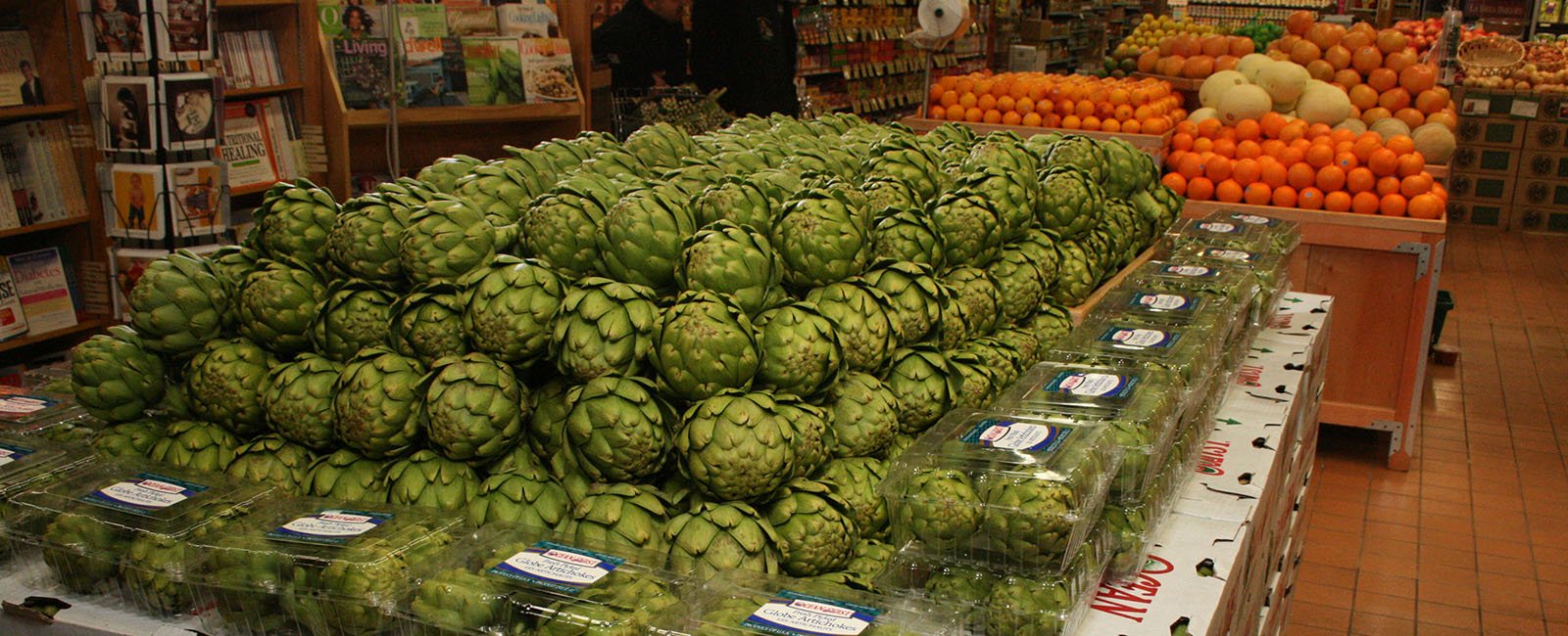 artichokes on display in a store