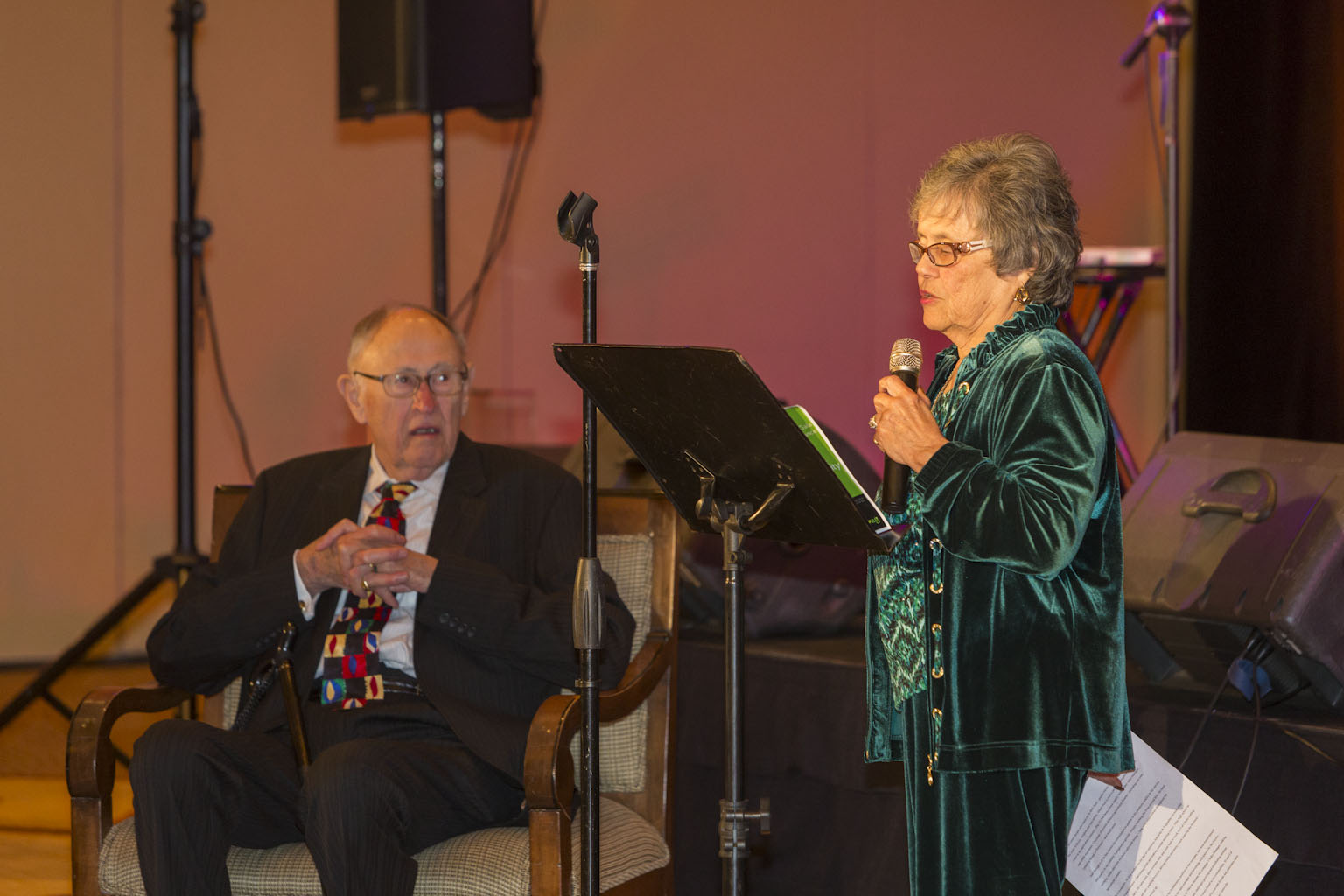 Al Seated with Bobbie giving acolades 2